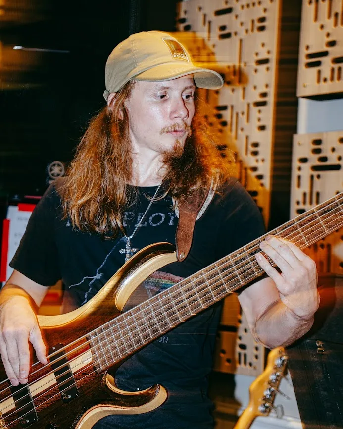 Benji Stiles playing electric bass