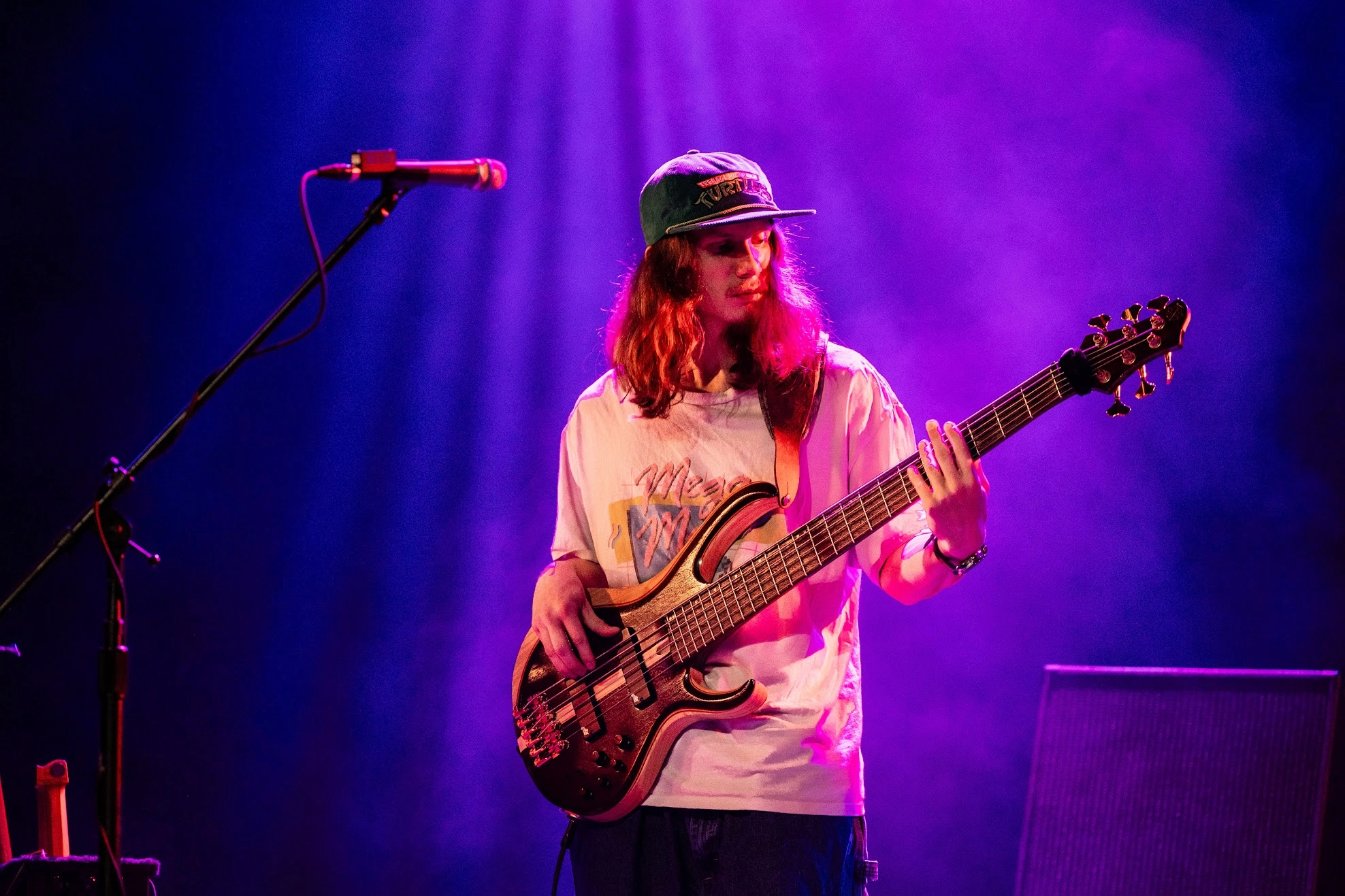 Benji Stiles performing on electric bass